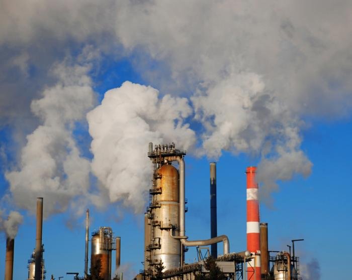 industrial-factory-pipes-releasing-pollution-into-the-air.jpg