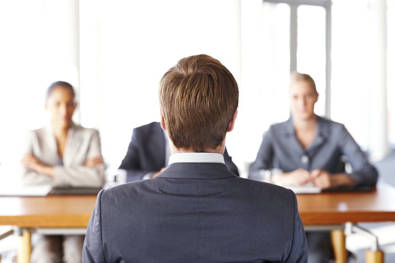 young-man-job-interview-rear-view.jpg