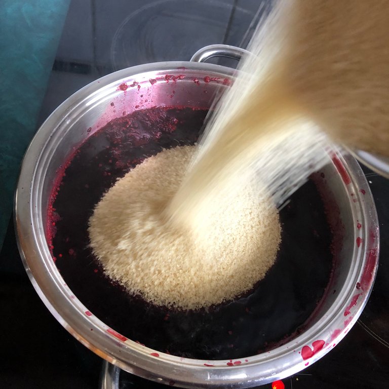 Add sugar to the mulberry jam