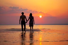 two-people-love-sunset-16041145.jpg