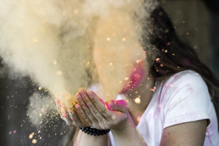 woman-in-white-cap-sleeved-shirt-blowing-dust-632722.jpg