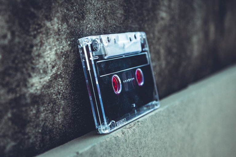 black-and-gray-cassette-tape-leaned-on-wall-1761362.jpg