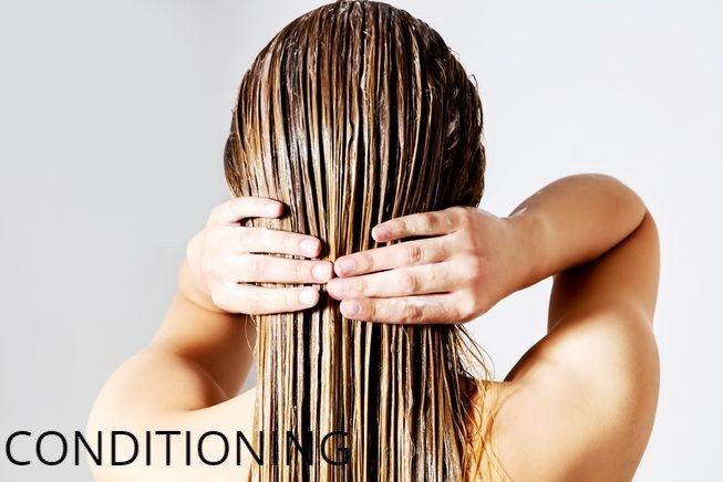 woman_washing_conditioning_hair.jpg.653x0_q80_crop-smart (1).jpg