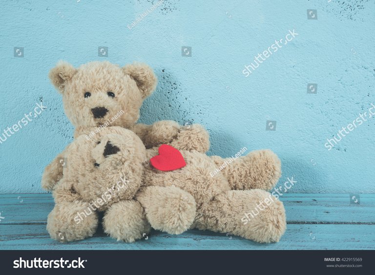 stock-photo-teddy-bears-love-422915569.jpg