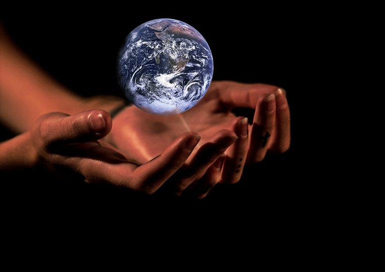 hands with planet earth.jpg