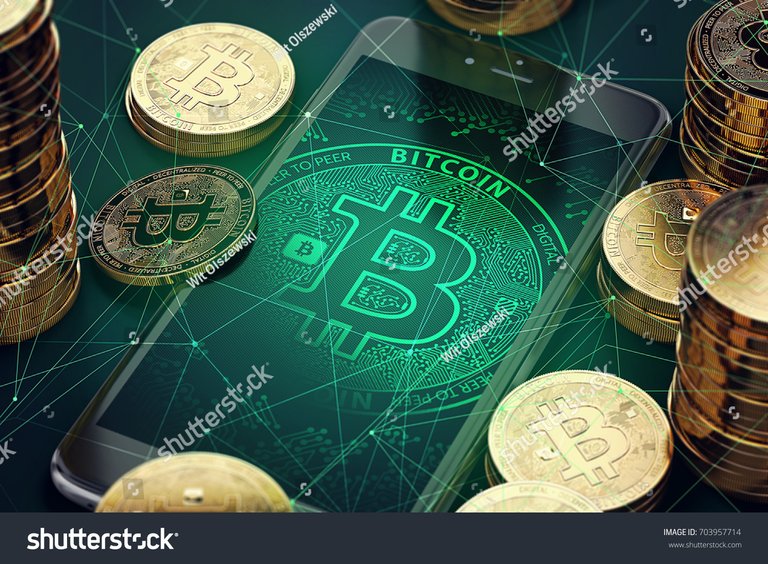 stock-photo-smartphone-with-bitcoin-symbol-on-screen-among-piles-of-golden-bitcoins-blockchain-transfers-703957714.jpg