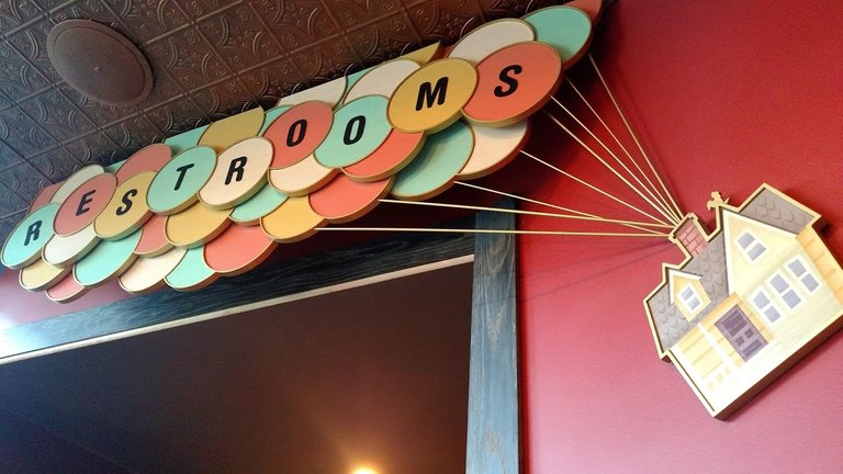 Lamp light lounge disneyland pixar pier bathrooms sign 3.jpg