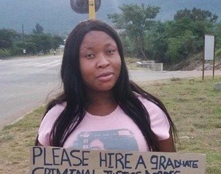 Jobless-And-Frustrated-Female-Graduate-Begs-For-Job-By-The-Roadside-With-Placard--Photo-695892110579227539.jpg