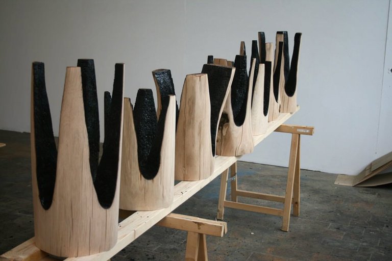 Upside-Down-Ausgebrannt-Stools-with-Burnt-Interiors.jpg