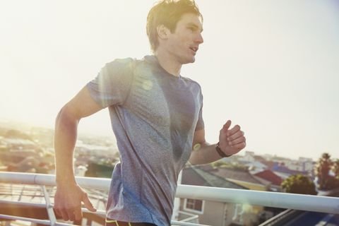 sweaty-male-runner-running-on-sunny-urban-royalty-free-image-691051643-1533931422.jpg