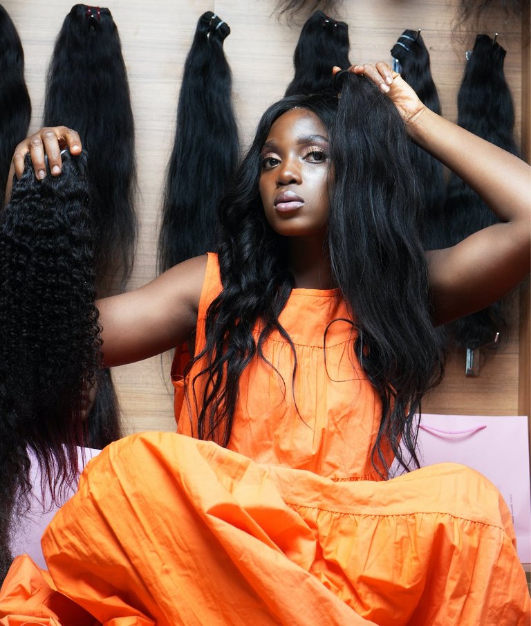 free-photo-of-young-woman-trying-different-wigs.jpeg