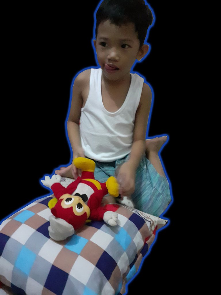 Leigh and Jollibee on pillow.png