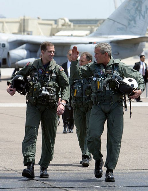 George_W._Bush_walks_with_Ryan_Phillips_to_Navy_One[1].jpg