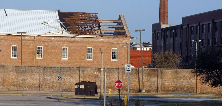 US_Navy_040918-N-0000W-007_Hurricane_Ivan_removed_the_roofs_of_several_buildings_on_board_Naval_Air_Station_Pensacola.jpg