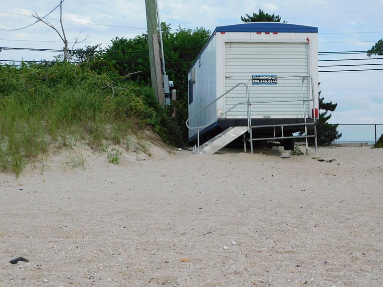 trailer on the beach.png