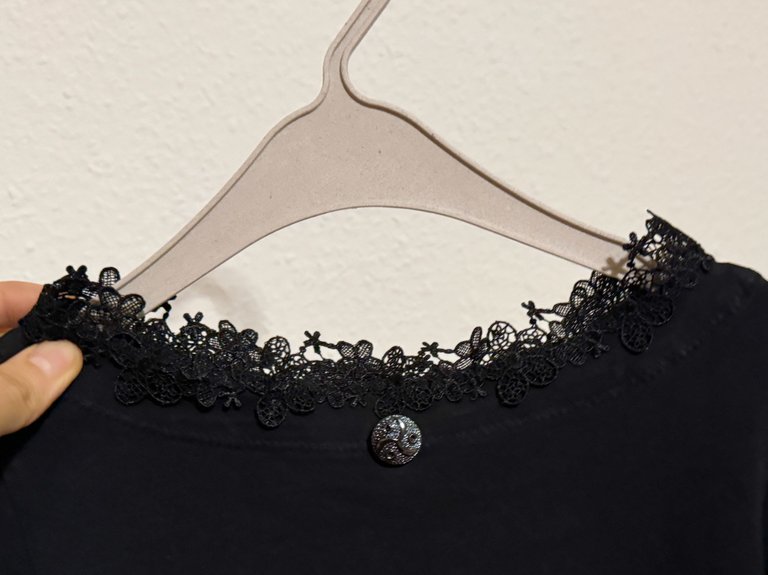 The black lace around neck