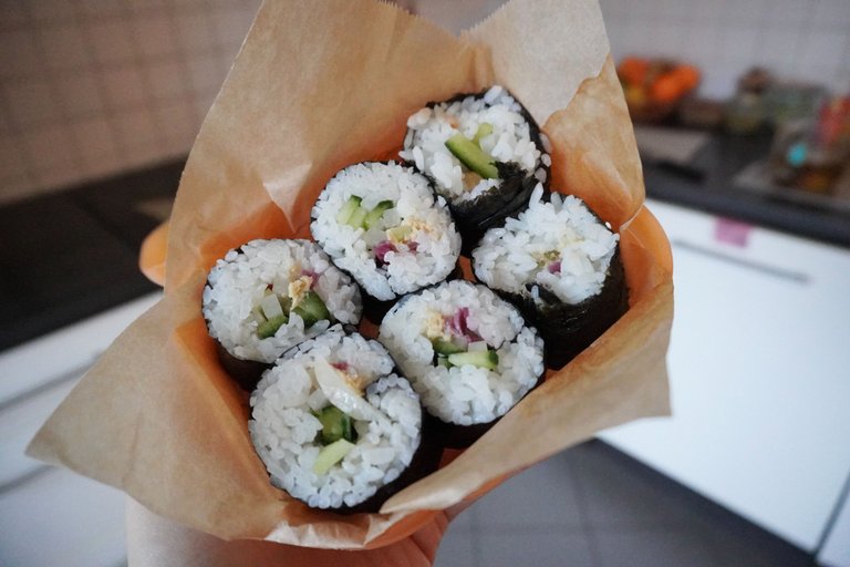 Vegan tuna sushi rolls in bento box