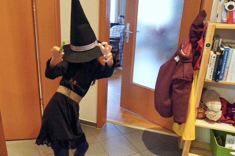 My daughter in the witch costume