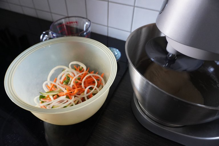 Preparing Japanese Toshikoshi Soba and German New Year Pretzels