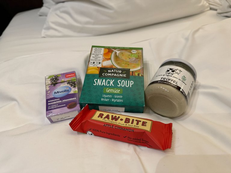 Travel snacks: candies, soups, spreads, and energy bars.