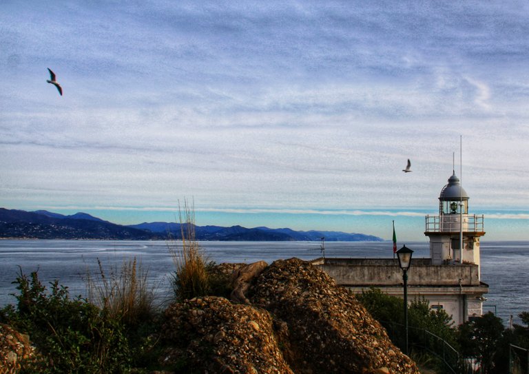 Lighthouse and Cinque Terre in the background