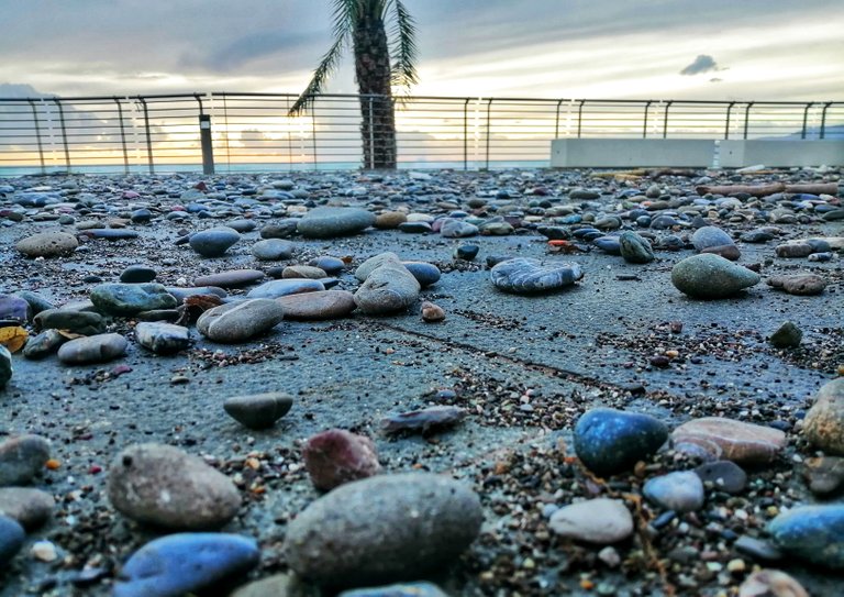 Rocks thrown on the promenade by the storm...