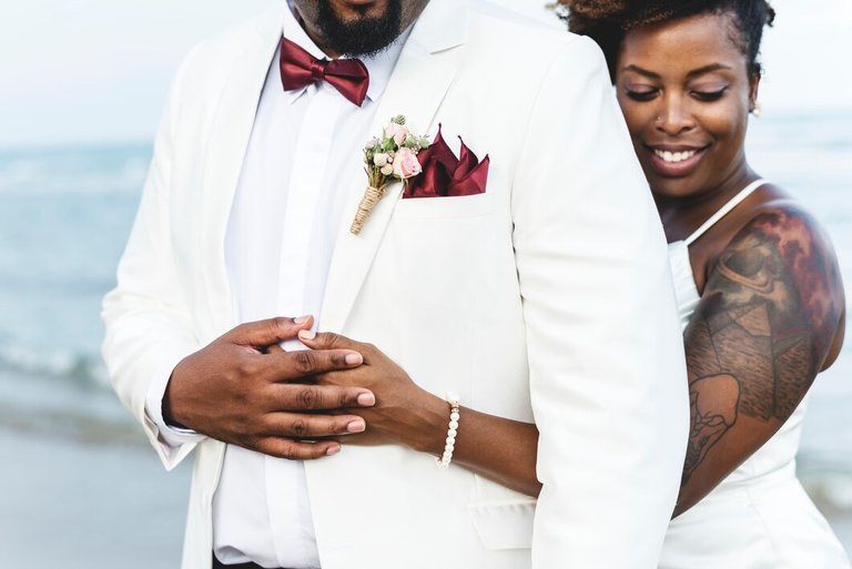 african-american-couple-getting-married-island_53876-41073.jpg