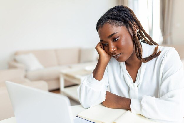 serious-frowning-african-american-ethnicity-woman-sit-workplace-desk-looks-laptop-screen-read-email-feels-concerned-bored-unmotivated-tired-employee-problems-difficulties-with-app_657921-1669.jpg