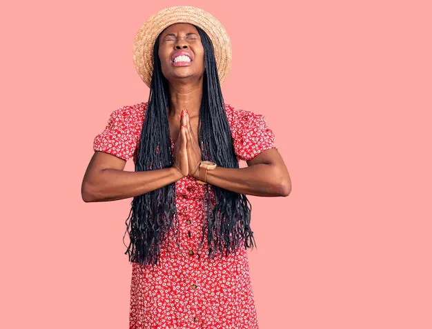 young-african-american-woman-wearing-summer-hat-begging-praying-with-hands-together-with-hope-expression-face-very-emotional-worried-begging_839833-29141.webp