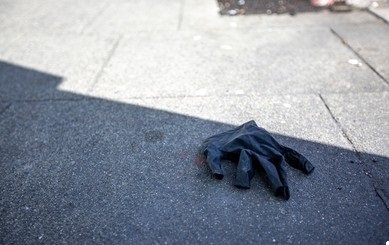 disposable-black-gloves-on-street-260nw-1692792559.jpg