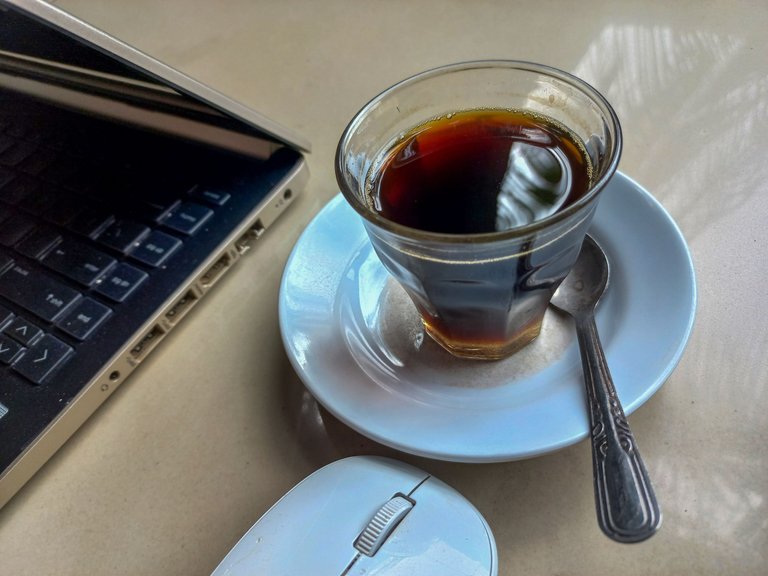 "CUP OF COFFEE, LAPTOP AND SUPPORTING EQUIPMENT" by @bantamuda