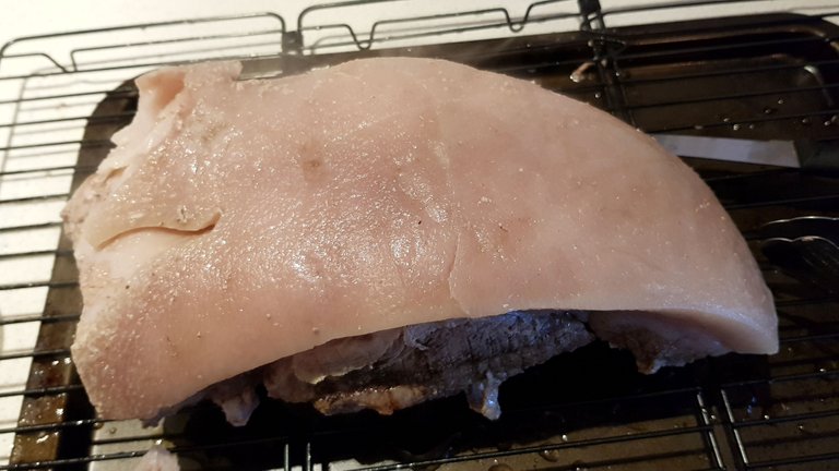 Step 3. See top left of the pork shoulder, that's what I mean about the skin ripping apart.