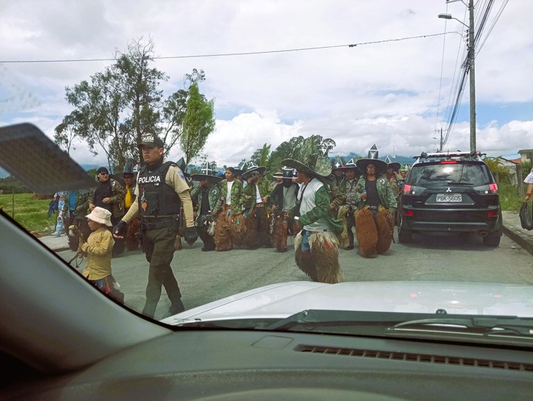 A couple of musicians in the middle of the first row, and a captain between the cop and the musicians. They all wear Zamarros, traditional leg garment made out of leather and goat skin, to protect from the cold in the nights.
