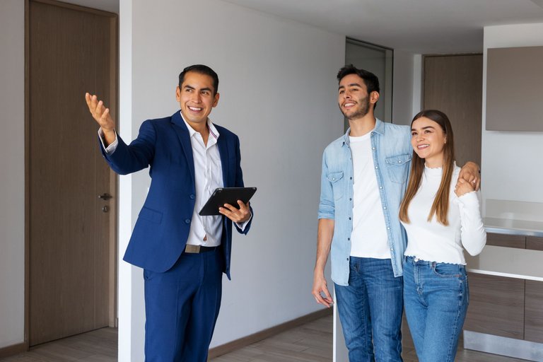 medium-shot-couple-talking-real-estate-agent.jpg