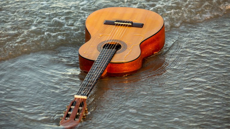 Giving this guitar to the ocean was an exciting surrender to the flow of the present moment.