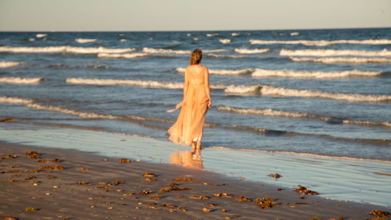 Kate wore her wedding dress as she walked into the sea.