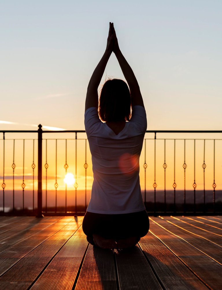 full-shot-woman-meditating-outdoors.jpg