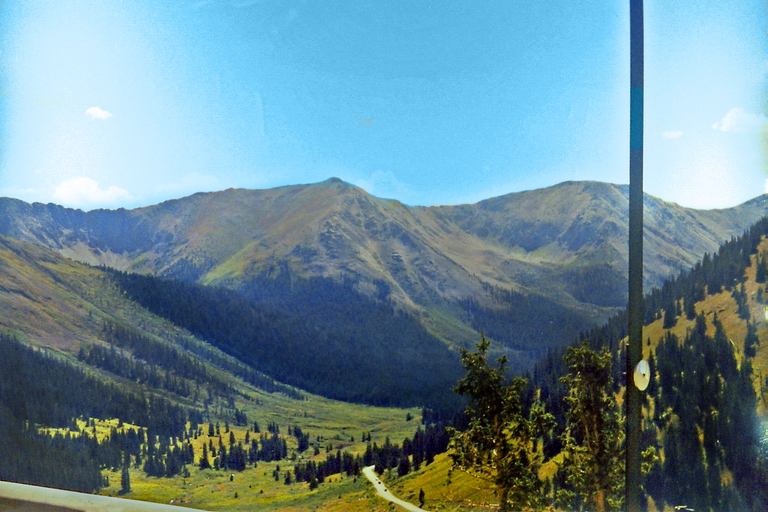 DRIVING UP TO NDEPENDANCE PASS LOOKING BACK DONW ON INDEPENDANCE GHOST TOWN-COLORADO 98-#1.png