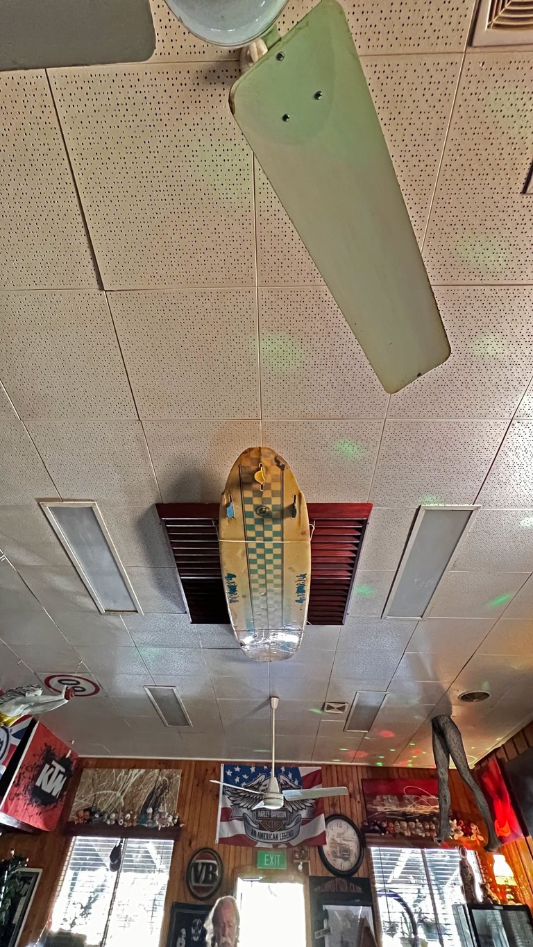 BB-INSIDE BAR-SURFBOARD ON ROOF.png