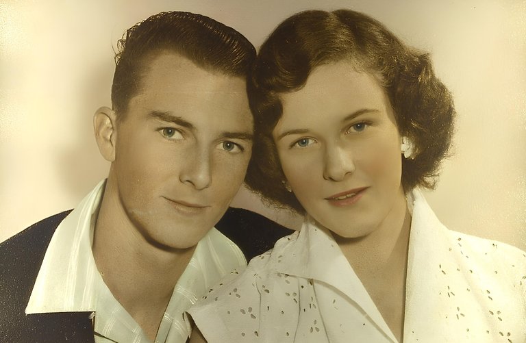 MUM AND DAD COLOUR FACE ON PORTRAIT.png