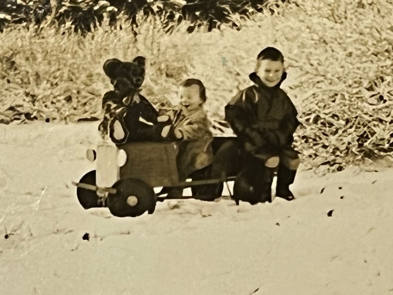 UNCLE KEITH AND BABY DAD WITH OLD TEDDY.jpeg