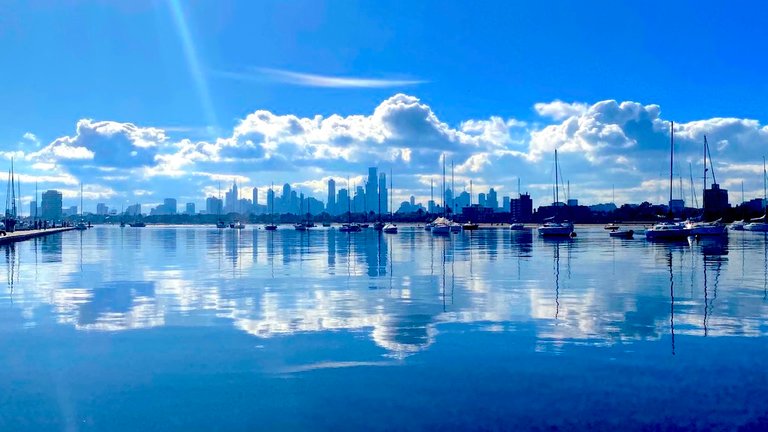 city reflections and still sailboats.jpg