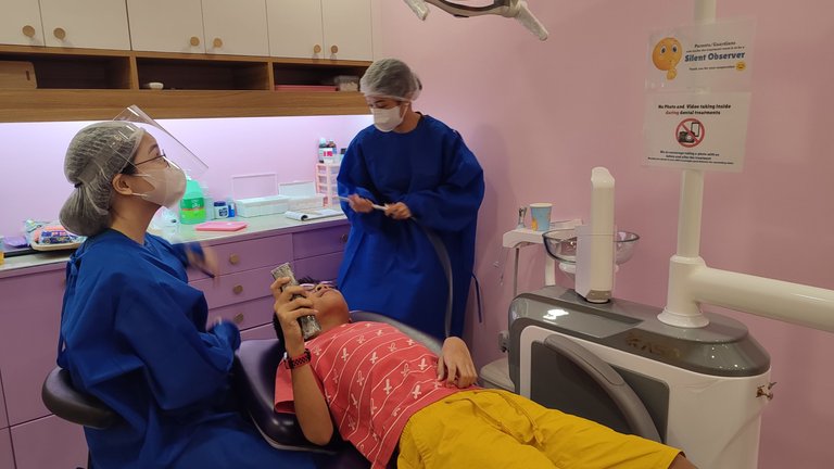 It took him a few minutes of fiddling with the remote and trying to distract himself with television before he finally settled into the dental chair. The dentist patiently explained the procedure as he relaxed.