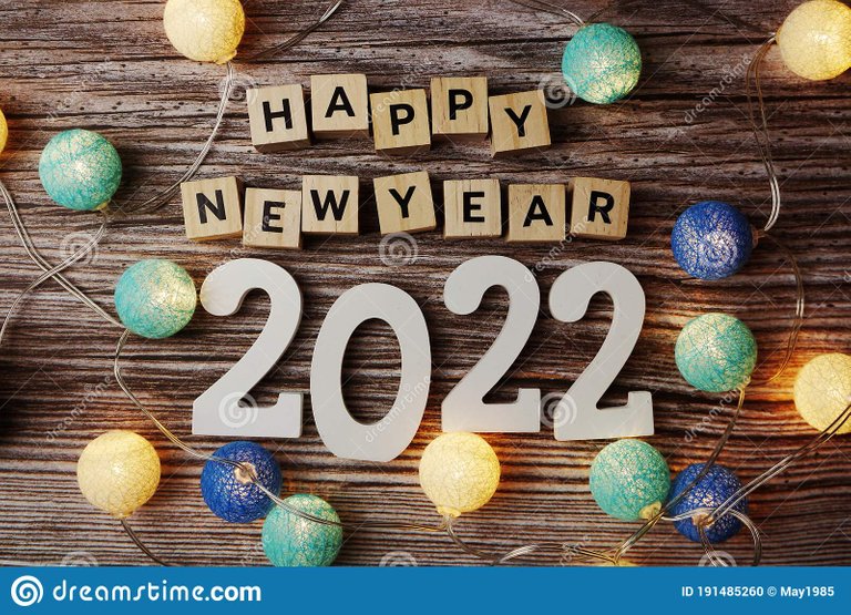 happy-new-year-decorate-led-coton-ball-wooden-background-191485260.jpg