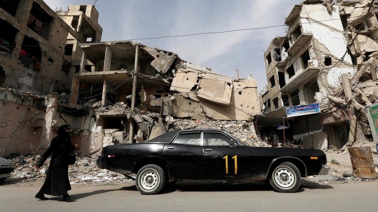 w1280-p16x9-2021-03-12T170010Z_59561336_RC2H9M9HBI67_RTRMADP_3_SYRIA-SECURITY-ANNIVERSARY-DOUMA.jpg