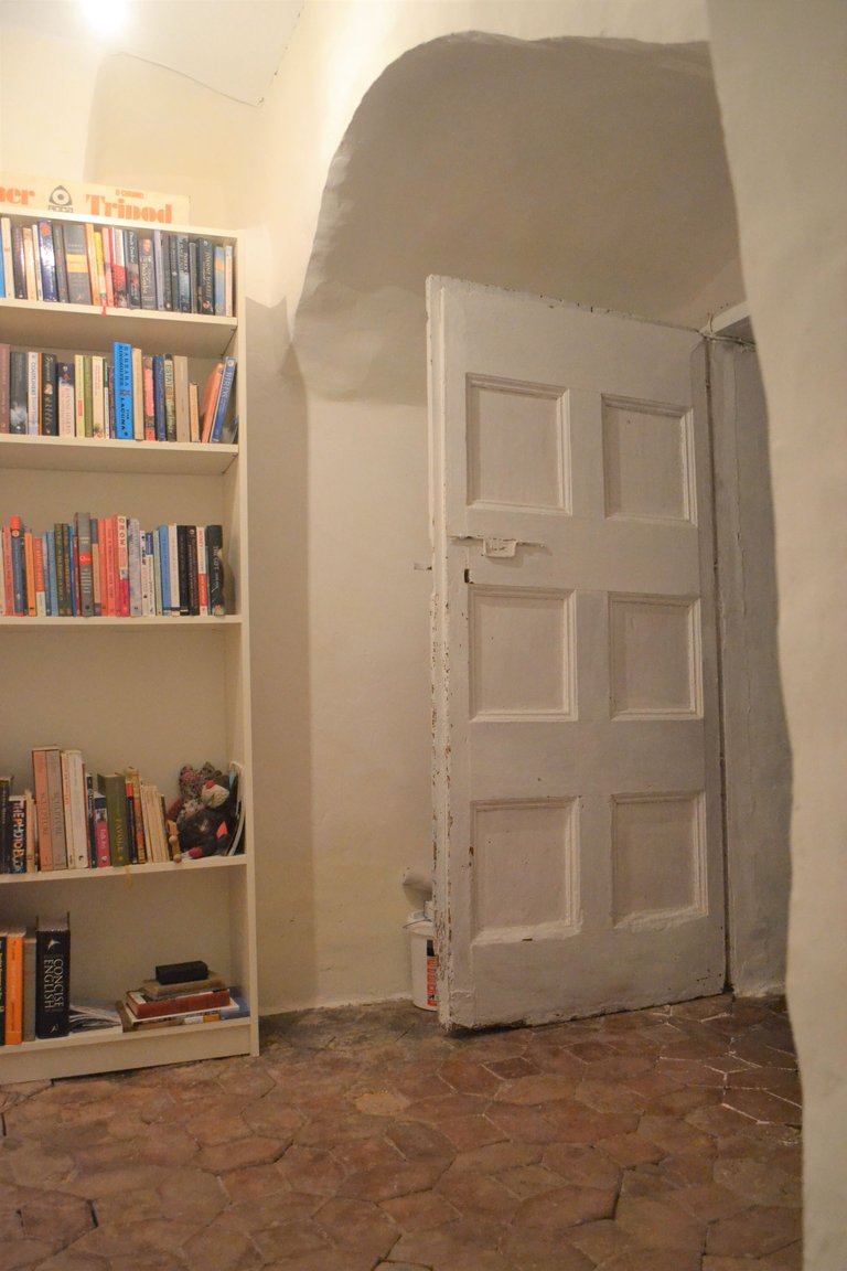 18 master bedroom - second back room - old door.JPG