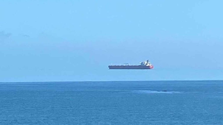 a-ship-appears-to-hover-over-the-sea-off-the-coast-of-cornwall.1614983389276.jpeg