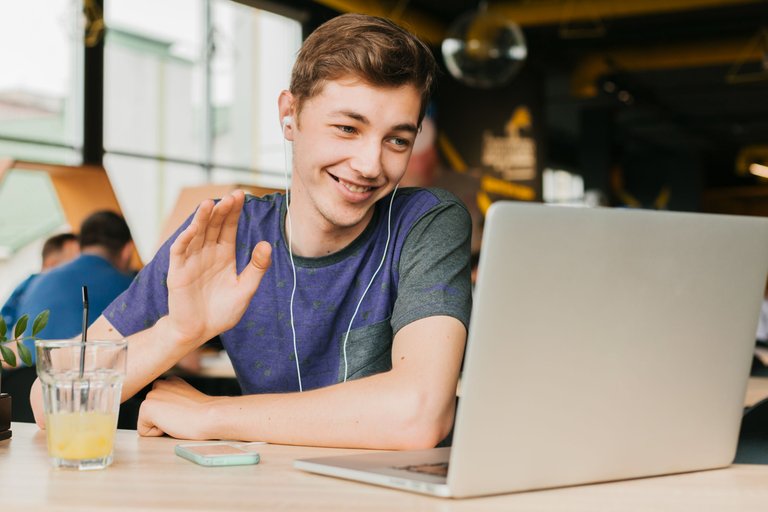 young-man-doing-videocall-laptop.jpg