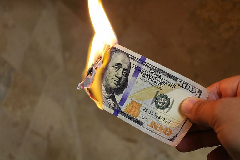 burning-money-dollars-cash-flame.jpg