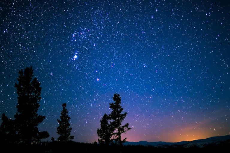 Mountain Silhouettes under Starry Sky.jpeg